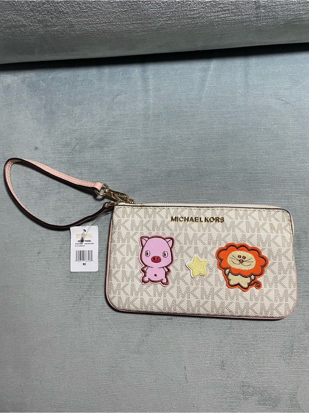 Michael Kors Beige signature Logo Wristlet NWT with  7 Cute Embroidered Patches